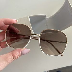 Prada Decode Sunglasses - SPR 67X in Beige/White